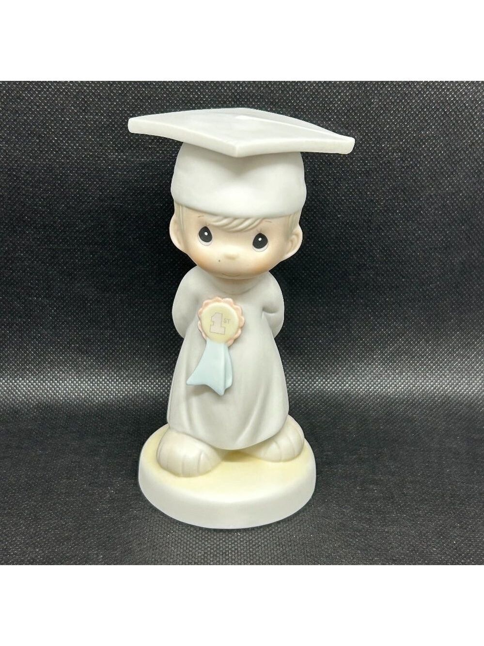Precious Moments “God Bless You Graduate" figurine
